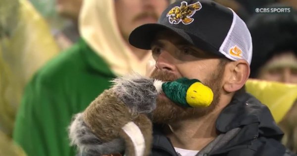Squeaky Dog Toy_Screenshot from CBS Sports Video.jpg