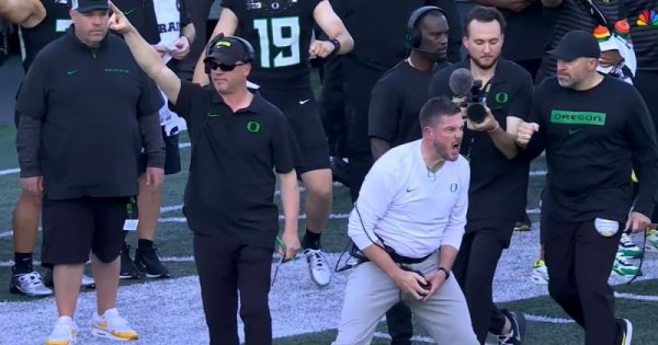 Coaches Joe Lorig and Dan Lanning_Screenshot from NBC Sports Video.jpg