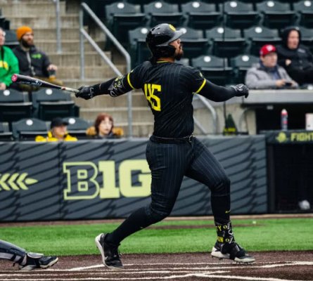 Hellman watches his 3-Run blast vs. Xavier.jpg