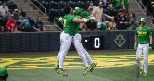 Naulivou Lauaki Jr and Drew Smith after Smith HR vs Nebraska_Rob Moseley.jpg